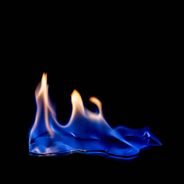 fire blue hot on black background. - Фото, изображение