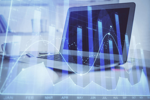 Forex Chart hologram on table with computer background. Multi exposure. Concept of financial markets. - Foto, imagen