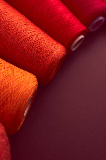 Composition of colorful vibrant wool threads from above. Autumn colours - Photo, image