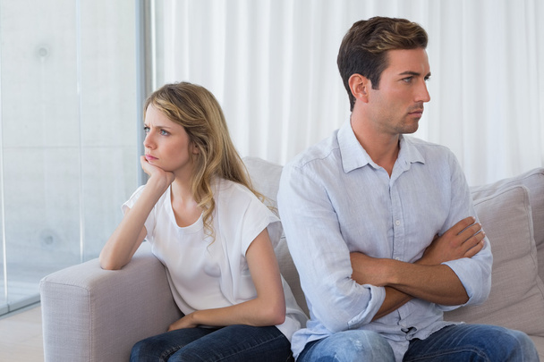 Couple not talking after an argument in living room - Photo, Image