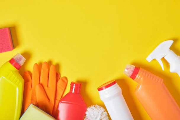 various detergents for cleaning on a yellow background place copy top view, - Φωτογραφία, εικόνα