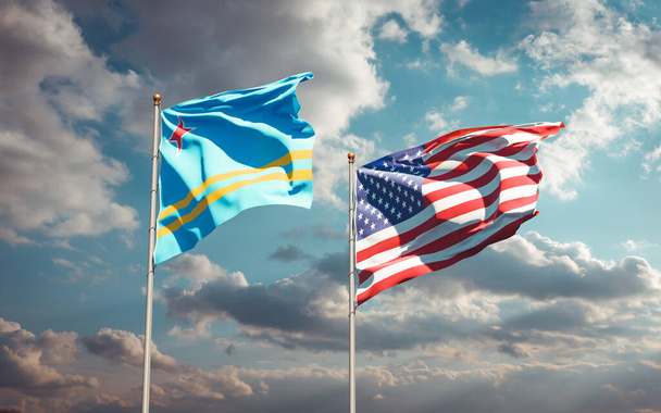 Όμορφες εθνικές σημαίες των ΗΠΑ και της Αρούμπα μαζί στο φόντο του ουρανού. Έννοια τρισδιάστατης τέχνης.  - Φωτογραφία, εικόνα