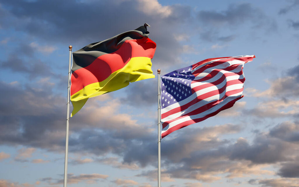 Όμορφες εθνικές σημαίες της Γερμανίας και των ΗΠΑ μαζί στο φόντο του ουρανού. Έννοια τρισδιάστατης τέχνης.  - Φωτογραφία, εικόνα
