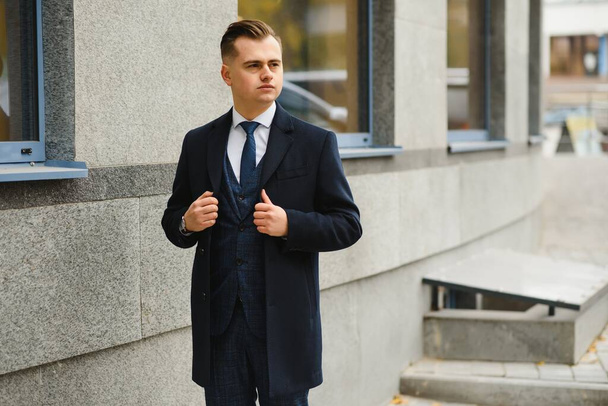young business man, wearing stylish classic suit - Foto, Imagen
