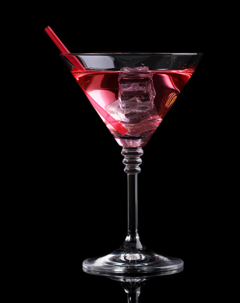 Red cocktail in martini glass isolated on black - Φωτογραφία, εικόνα