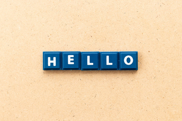 Tile letter in word hello on wood background - Photo, Image