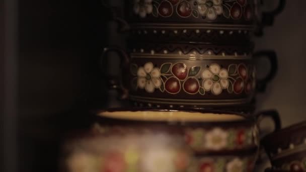 Chamomiles, wooden beads and decorative textile belt of white embroidered fabric - Footage, Video