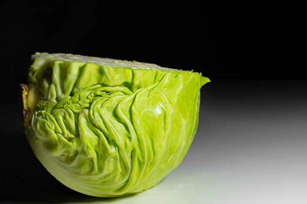green cabbage on the table close-up. High quality photo - Zdjęcie, obraz