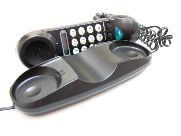 Один черный телефон с кнопками
 - Фото, изображение