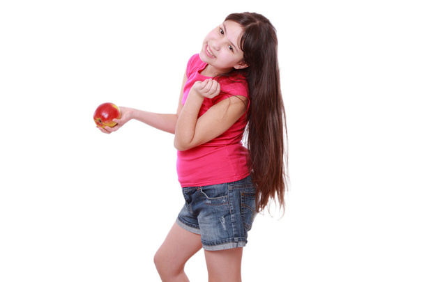 Girl with apple - Фото, изображение