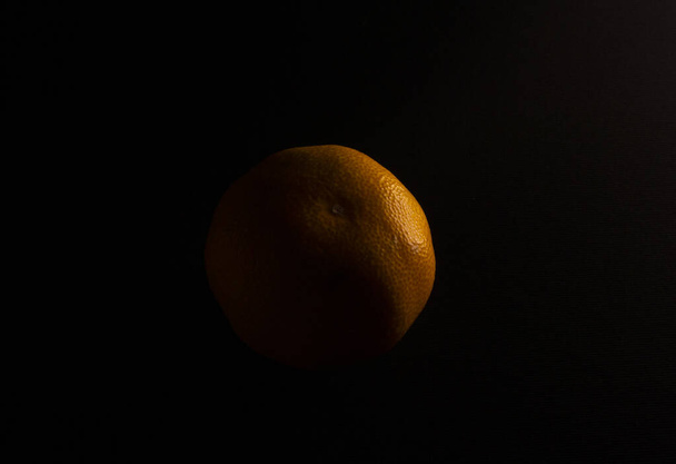 fresh mandarin on black background - 写真・画像