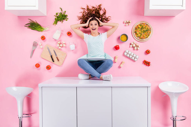 Top above high angle view full body photo positive astonished housewife girl sit table impressed prepare delicious pizza flat lay eggs tomato knife utensils isolated pastel color background - Foto, afbeelding