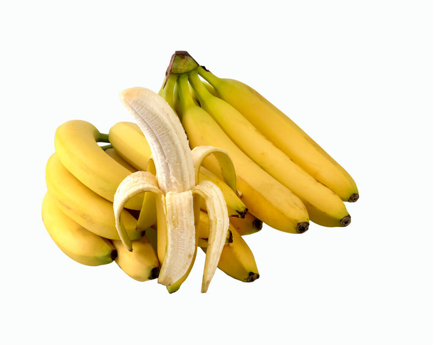 Um monte de bananas rasgadas no fundo branco. Caminho de recorte.  - Foto, Imagem