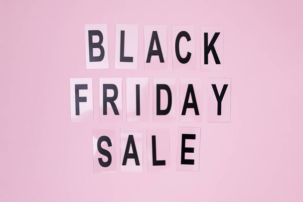 Text Black Friday Sale on pink background - Фото, зображення