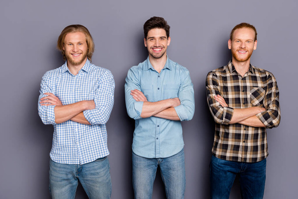 Portrait of three nice attractive cheerful cheery content guys best buddy fellow team it company coworkers folded arms isolated over gray purple pastel color background - Fotoğraf, Görsel
