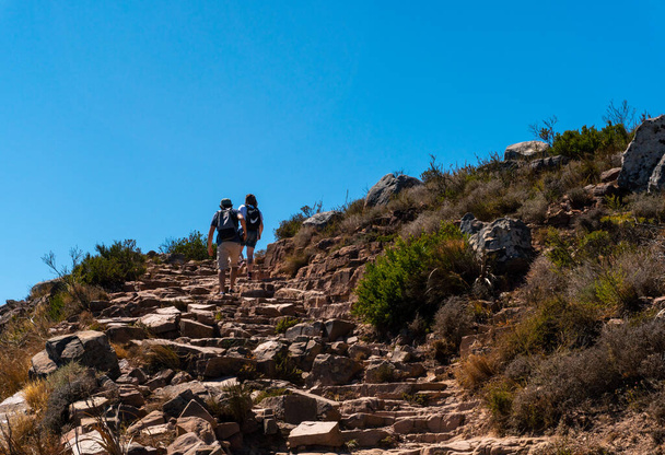 Hikers or tourists ascending Lions Head mountain - Fotó, kép