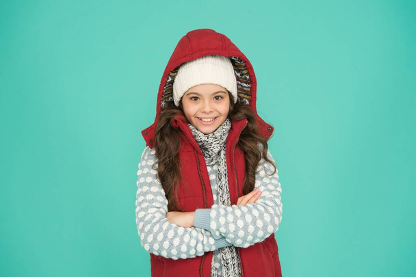 cold weather forecast. kid fashion and shopping. xmas time. ready for new year vacation. no hypothermia. cheerful girl wearing layers of clothing. warm clothes at wintertime season. Feeling frosty - Фото, зображення