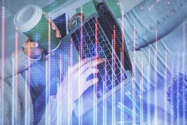 Double exposure of woman hands typing on computer and forex chart hologram drawing. Stock market invest concept. - Foto, immagini