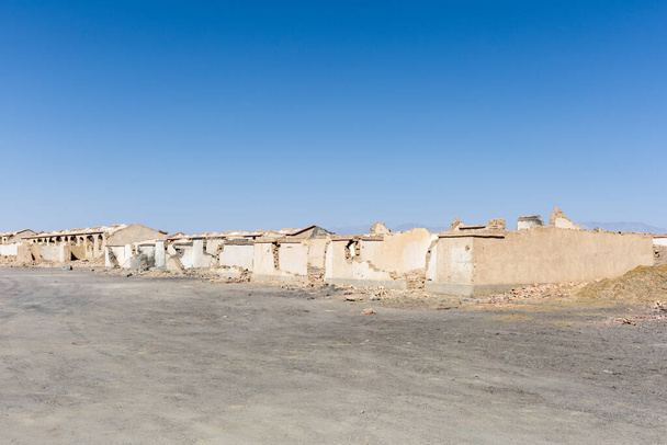 desolate scene of an abandoned town, the ruins of cold lake oil base, haixi mongolian and tibetan autonomous prefecture, qinghai province, China - Valokuva, kuva