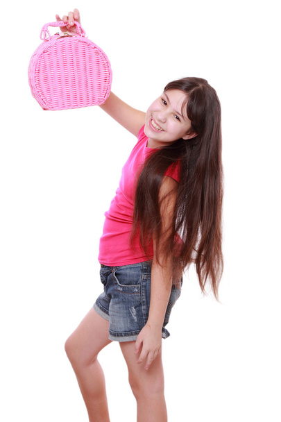 Girl holding a picnic basket - Фото, изображение