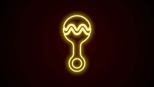 Ragyogó neon vonal Csörgő baba játék ikon elszigetelt fekete háttérrel. Babzsák jel. 4K Videó mozgás grafikus animáció - Felvétel, videó