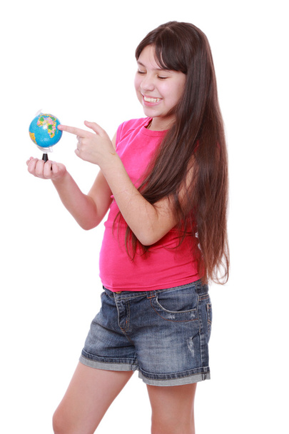 Girl holding globe - Fotoğraf, Görsel
