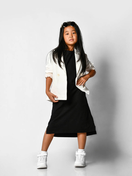 asian kid girl in black long t-shirt dress - Фото, зображення