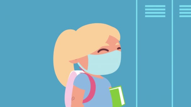 piccola studentessa indossando carattere maschera medica - Filmati, video