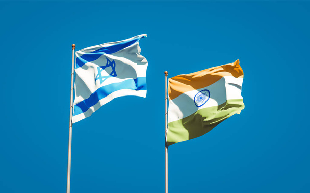Красивые национальные государственные флаги Израиля и Индии вместе на фоне неба. Концепция 3D оформления.  - Фото, изображение