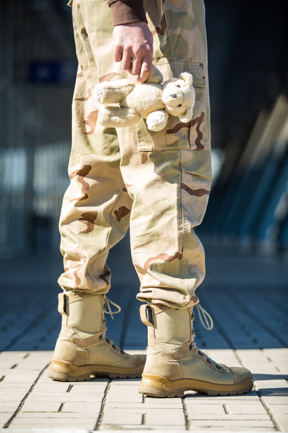 Military man with a toy - Photo, image