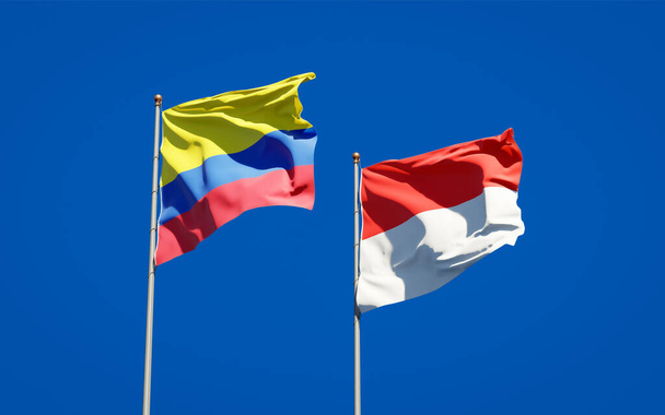 Beaux drapeaux nationaux de l'Indonésie et de la Colombie ensemble au fond du ciel. Concept d'illustration 3D.  - Photo, image