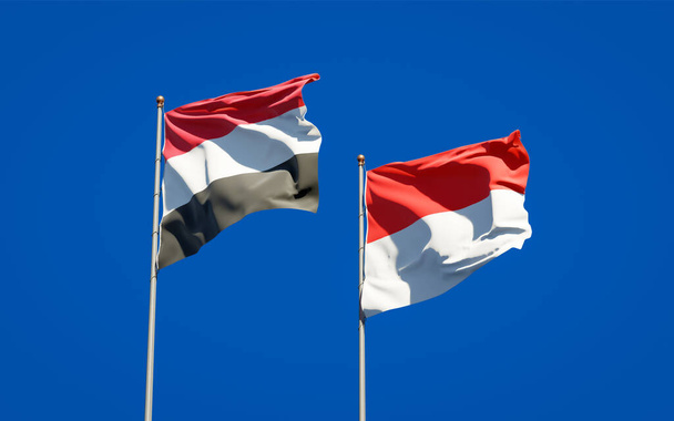 Beaux drapeaux nationaux du Yémen et de l'Indonésie ensemble au fond du ciel. Concept d'illustration 3D.  - Photo, image