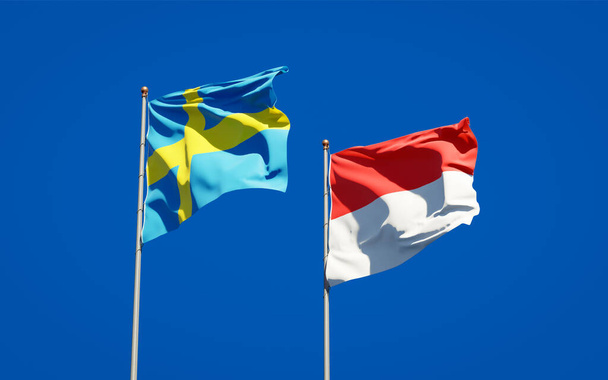 Beaux drapeaux nationaux de la Suède et de l'Indonésie ensemble au fond du ciel. Concept d'illustration 3D.  - Photo, image