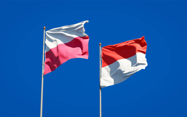 Gyönyörű nemzeti zászlók Lengyelország és Indonézia együtt az ég hátterében. 3D-s művészeti koncepció.  - Fotó, kép