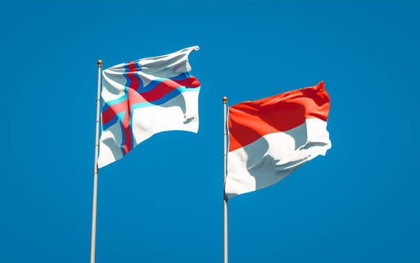Hermosas banderas estatales nacionales de las Islas Feroe e Indonesia juntas en el fondo del cielo. Concepto de obra de arte 3D.  - Foto, Imagen