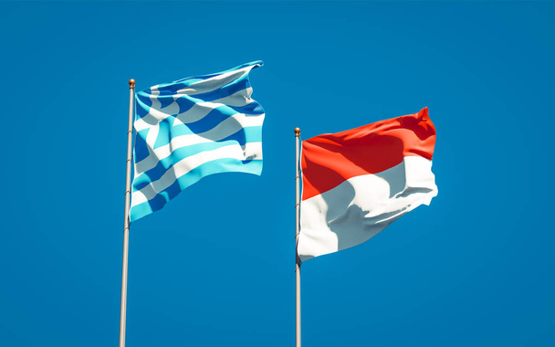 Красивые национальные государственные флаги Греции и Индонезии вместе на фоне неба. Концепция 3D оформления.  - Фото, изображение