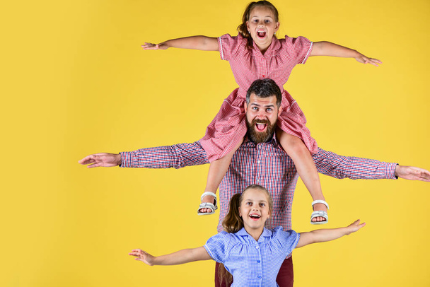 Just relax. bearded father with two small girls. kids love their dad. children with daddy. international childrens day. happy childhood. family values. fathers day. happy family concept - Photo, Image
