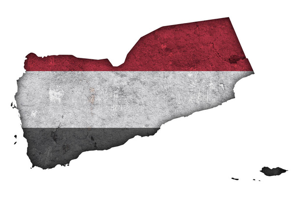 Mapa a vlajka Jemenu na ošlehaném betonu - Fotografie, Obrázek