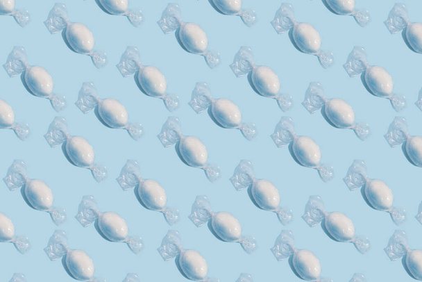Abstract set of blue candy on light blue backdrop. wallpaper. - Foto, imagen