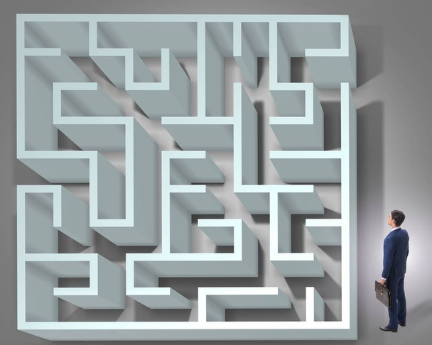 Businessman is trying to escape from maze labyrinth - Photo, Image