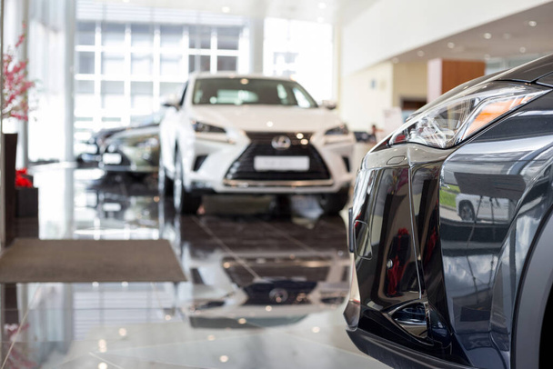 Russia, Izhevsk - July 21, 2019: Lexus showroom. New modern cars in the dealer showroom. Famous world brand. Prestigious vehicles. - Zdjęcie, obraz
