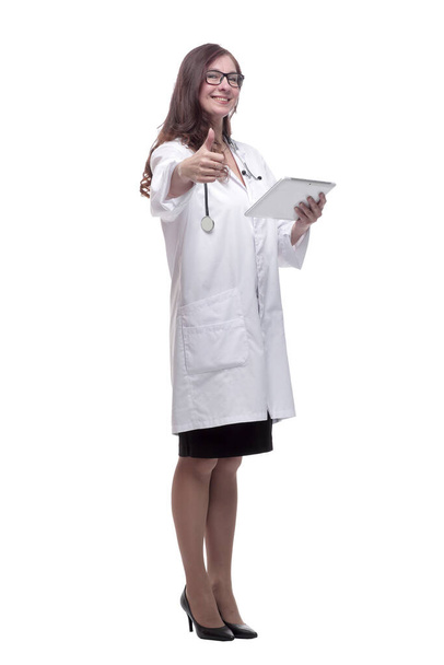 female doctor looking at a digital tablet screen - Fotó, kép