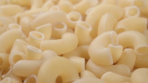 Dichtbijgelegen pasta. Een verscheidenheid aan pasta. Macro-video. - Video