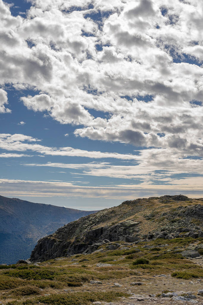 Steep rocky mountain landscape on a day with clouds. Sierra de Guadarrama, Madrid. - Photo, Image