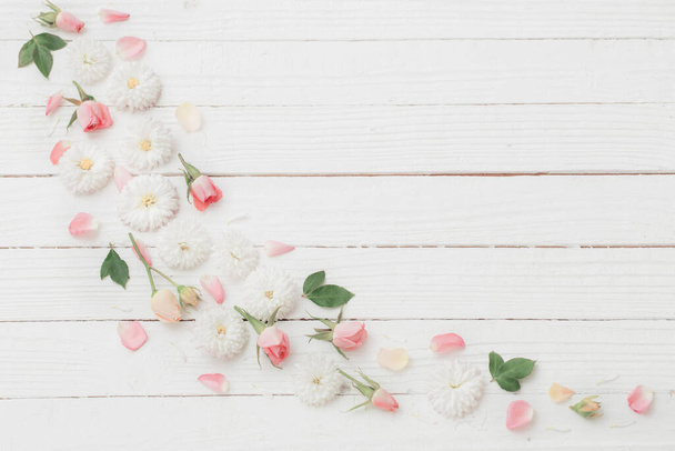 pink and white flowers on white wooden background - Photo, image