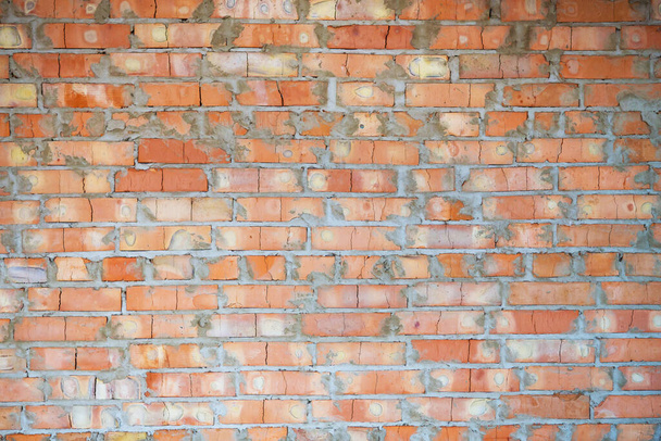 Background of a brick orange wall texture, close-up, place for an inscription - Photo, Image