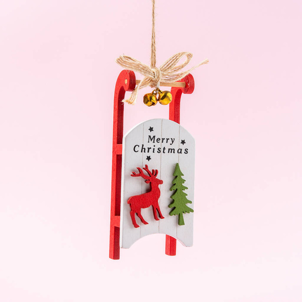 Santa claus sleigh on pink background. Minimal Christmas concept. - Zdjęcie, obraz