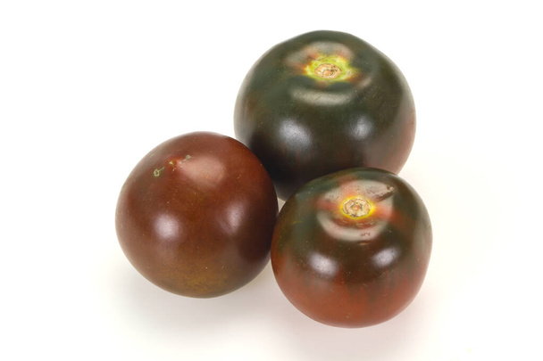 Siyah domates - lezzetli taze olgun Kumato  - Fotoğraf, Görsel
