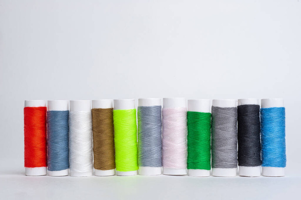 Colourful thread spools isolated on a white - Photo, Image