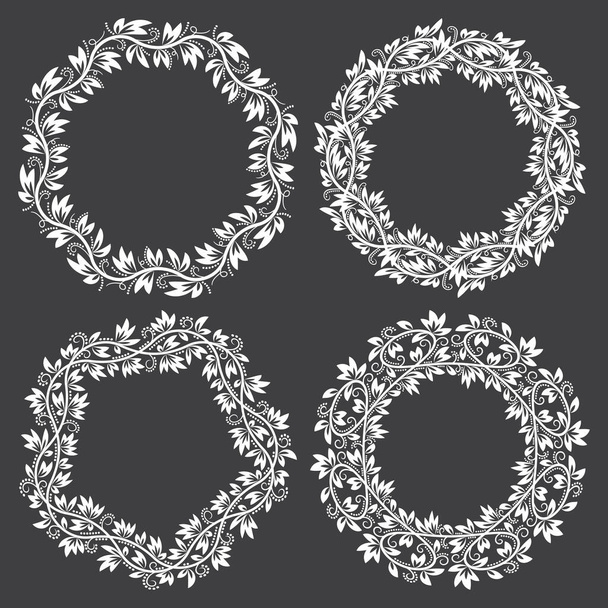 Patterned round frames for design in floral vintage style. White ornaments on black background. - Vector, Image